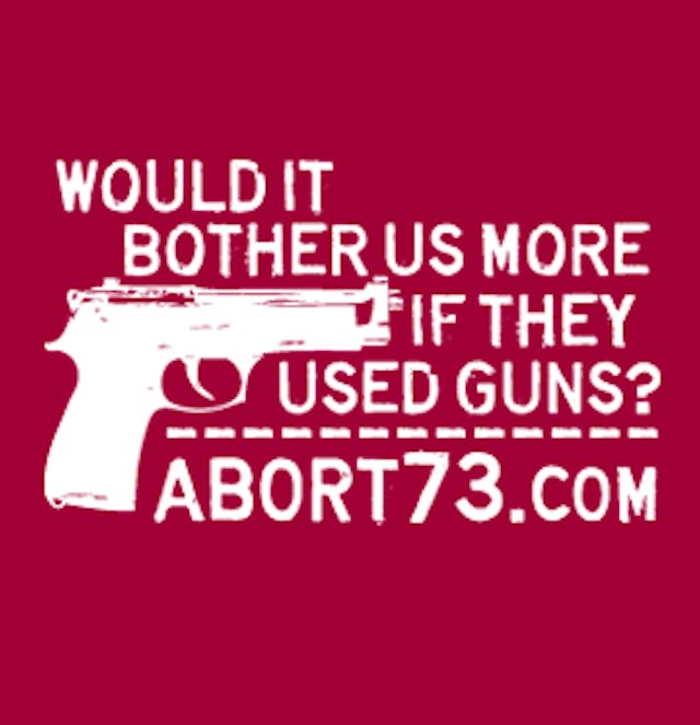 Abort 73’s pro-life t-shirt: ” Would it bother us more if they used guns” in reference to killing of children. Pro-life tee shirt from Abort73