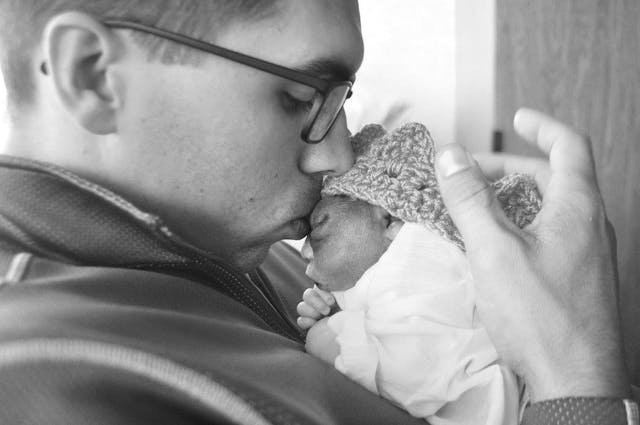 Clark being held by his father Cameron. Michelle Nagle Photography 12314248_10201420198264699_1454833070296786111_o