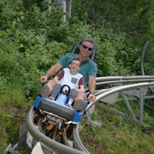 Dallan and Chad on a roller coaster. Photo via Facebook. Dallan and Chad on a roller coaster. Photo via Facebook.
