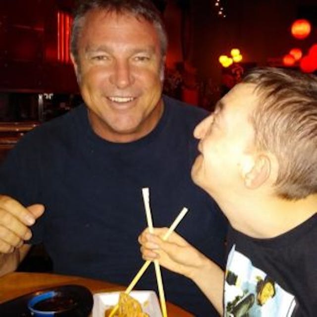 Dallan and Chad enjoying a meal. Photo via Facebook.