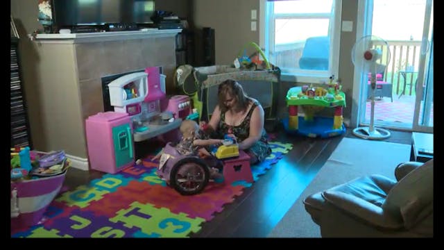 Screenshot from Global News report of Eva and her mom playing at home. Screenshot from Global News report of Eva and her mom playing at home.