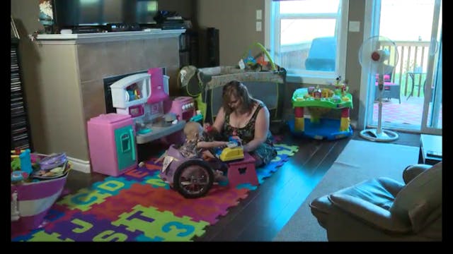 Screenshot from Global News report of Eva and her mom playing at home.