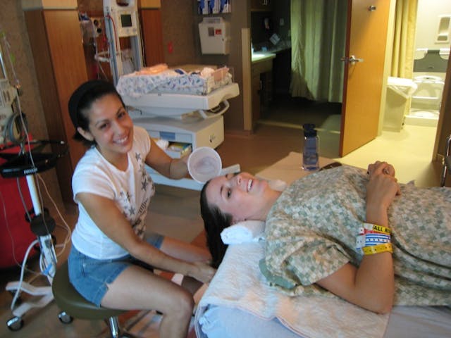 Melissa gets her hair washed while on bedrest.
