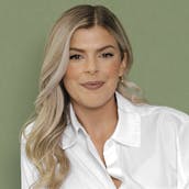 Allie Beth Stuckey headshot on green background