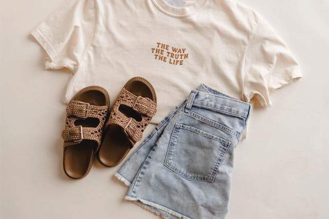 White tshirt, brown shoes, denim shorts