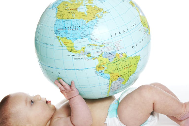 Baby and earth globe