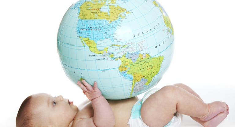 Baby and earth globe