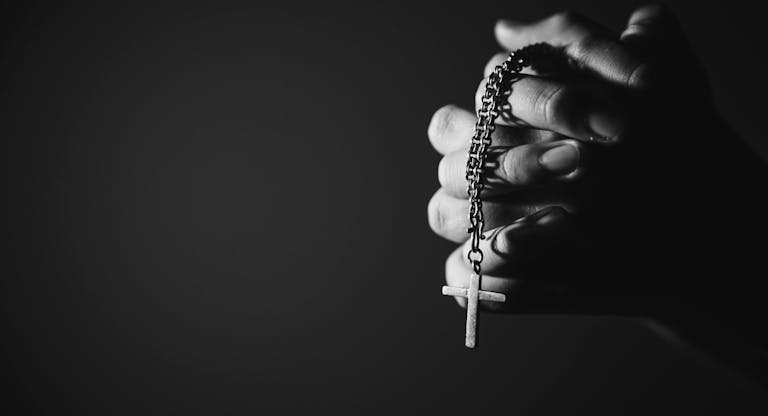 B&Wwoman hand cross