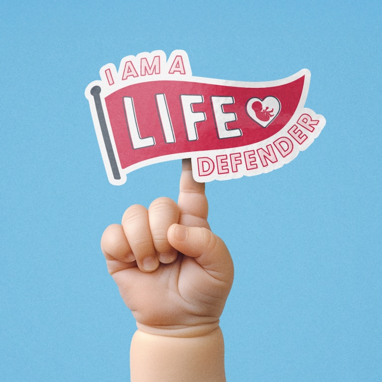 A baby hand with index finger pointing up