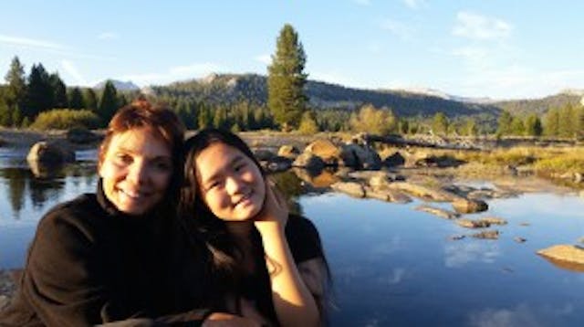 Reggie and her Chinese daughter, Anni Once a prisoner in China, Anni Zhang now performs at Carnegie Hall image