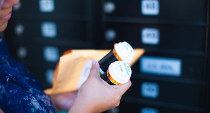 Woman Receiving Medicine by Mail