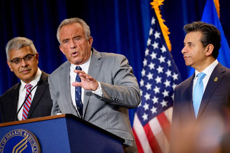 Photo: Andrew Harnik/Getty Images WASHINGTON, DC - APRIL 22: Health and Human Services Secretary Robert F. Kennedy Jr., accompanied by National Institutes of Health Director Jayanta Bhattacharya (L), and Food and Drug Administration Commissioner Marty Makary (R) speaks during a news conference at the Health and Human Services Department on April 22, 2025 in Washington, DC. Kennedy and Makary spoke about the intent of the FDA "to phase out the use of petroleum-based synthetic dyes in the nation's food supply."