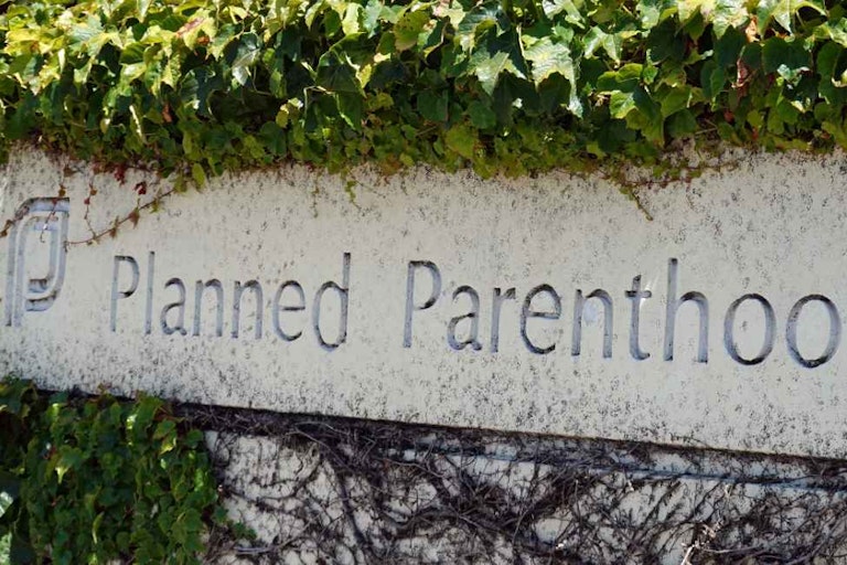 SAN RAFAEL, CALIFORNIA - JUNE 26: A sign is posted in front of a Planned Parenthood health center on June 26, 2025 in San Rafael, California. A Supreme Court ruling will allow states to cut Medicaid funds to reproductive health provider Planned Parenthood, which will disqualify Medicaid patients from obtaining health care services from Planned Parenthood providers if the funding has been cut by the state. (Photo by Justin Sullivan/Getty Images) Supreme Court Ruling Allows States To Cut Medicaid Funds To Planned Parenthood