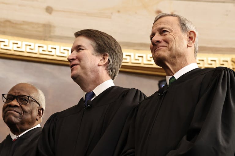 WASHINGTON, DC - JANUARY 20: U.S. Associate Supreme Court Justices Clarence Thomas and Brett Kavanaugh and U.S. Supreme Court Chief Justice John Roberts react during inauguration ceremonies in the Rotunda of the U.S. Capitol on January 20, 2025 in Washington, DC. Donald Trump takes office for his second term as the 47th president of the United States. (Photo by Chip Somodevilla/Getty Images) The Inauguration Of Donald J. Trump As The 47th President
