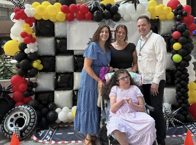 Faith Smith, who was diagnosed with Trisomy 18 as an infant, with her family at a recent SOFT (Support Organization for Trisomy) conference. New AAP guidelines affirm Trisomy 13 and 18 are no longer ‘incompatible with life’ image