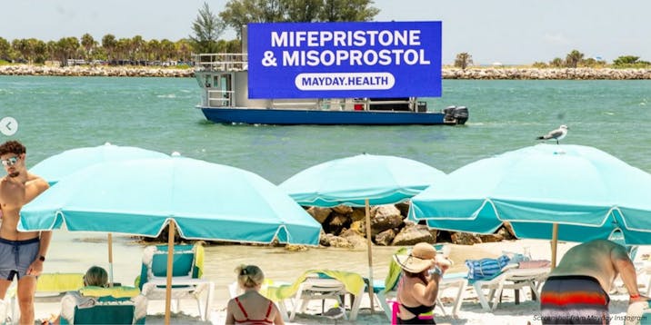 photo of Mayday Health advertisement for abortion pill on boat