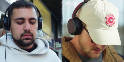 Two men wearing headphones watch a video separately