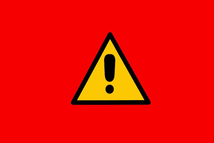 Warning sign with yellow and black triangle with exclamation mark, on red background. Danger, risk, caution, attention, road sign and care concept.