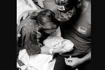 Screenshot: Drake White Instagram Country star Drake White and his wife, Alex, hold their daughter Della in the hospital.