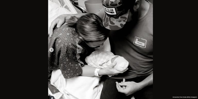 Country star Drake White and his wife, Alex, hold their daughter Della in the hospital.