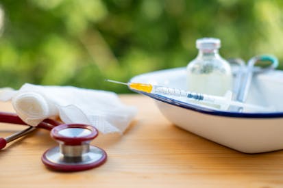 Medical instruments, Healthcare tools syringe, medicine ampoule, stethoscope, injection equipment, terminal care ethics, end-of-life medical ethics, patient rights, controversial healthcare topics