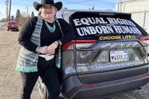 Photo courtesy of JC Carpenter JC Carpenter next to her pro-life car