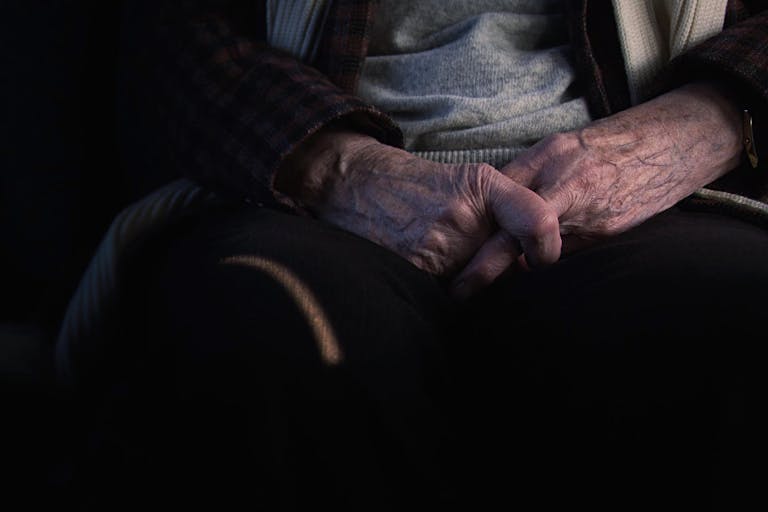 Photo: Getty Images Midsection Of Senior Man In Darkroom