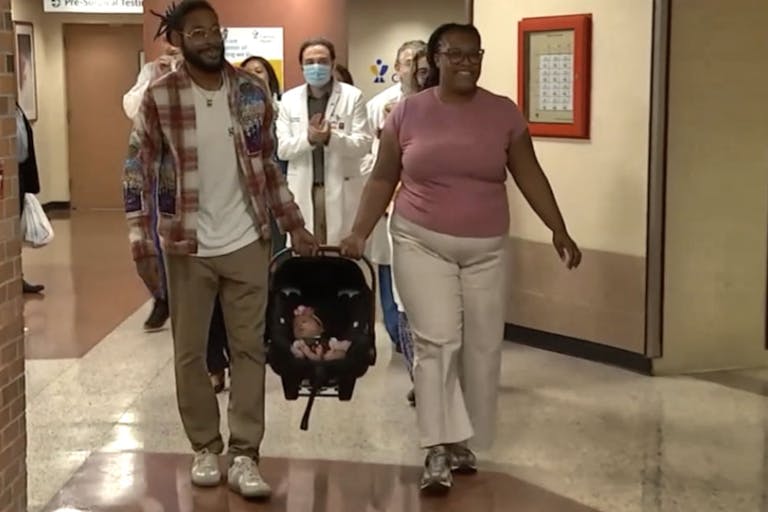 Screenshot: ABC7 Trinity and her parents leave Mercy Hospital