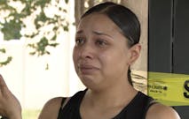 tearful woman recounts rescuing crying newborn baby from dumpster