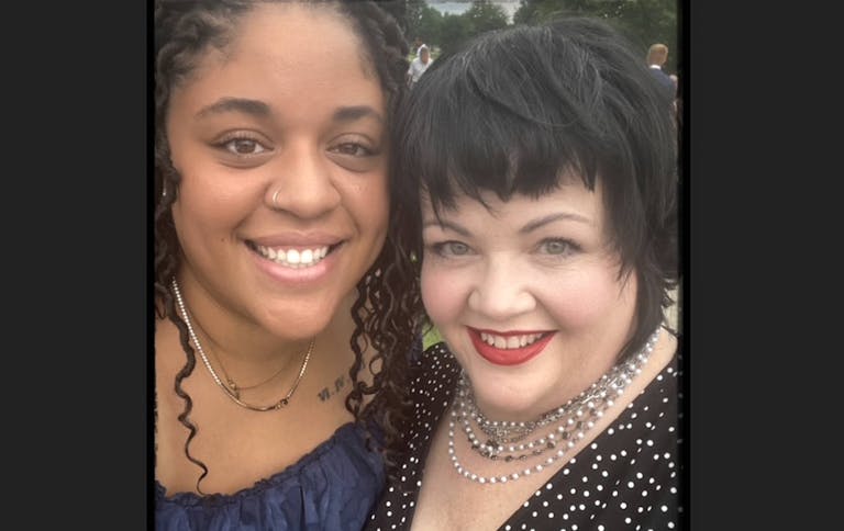 Kim Elliot and her daughter pose together for a happy photo