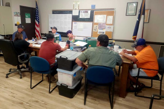 City Council meets in Avery, Texas (Photo: Mark Lee Dickson) city council members seated around conference table
