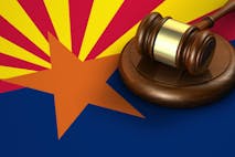 Photo: NiroDesign/Getty Images Arizona US state law, code, legal system and justice concept with a 3d render of a gavel on the Arizonan flag on background.