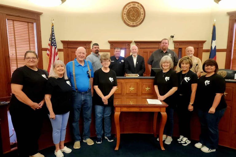 After the historic vote, Hopkins County Judge Newsom and County Commissioners take a picture with leadership from Northeast Texas Heart of Hope Pregnancy Resource Center