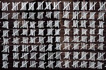 Photo: Dóra Bíró (Getty Images/iStockphoto) Counting stripes calendar. Handmade tally marks written on the wall by white chalk. Endless pandemie lockdown, longtime prison, waiting for the summer, ancient counting methods concept.