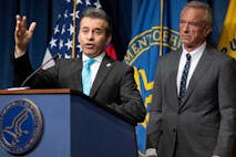 Food and Drug Administration (FDA) Commissioner Dr. Marty Makary speaks alongside US Health and Human Services (HHS) Secretary Robert F. Kennedy, Jr., as they announce the sending of warning letters to companies for illegally marketing products containing 7-hydroxymitragynine, also known as 7-OH, as part of their actions combatting opioids, during a press conference at HHS headquarters in Washington, DC, on July 29, 2025. (Photo by SAUL LOEB / AFP)