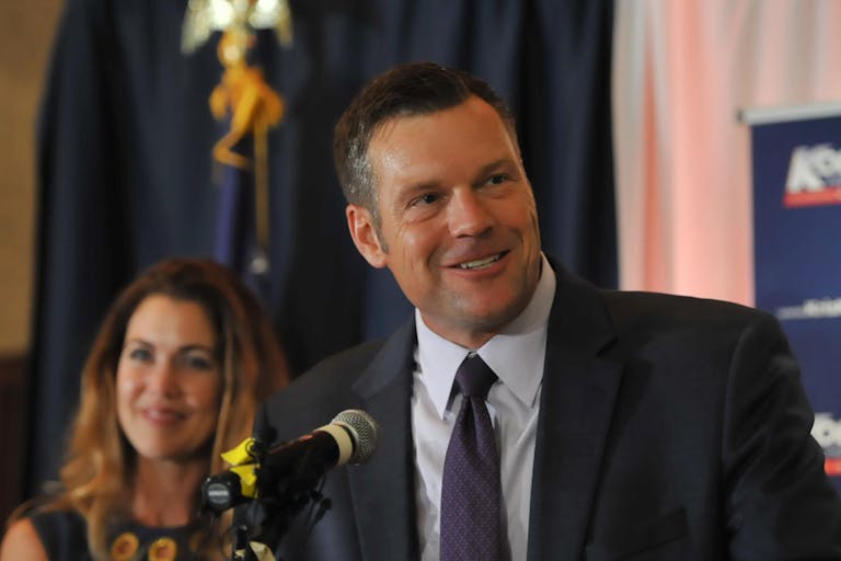 TOPEKA, KS - AUGUST 07: Republican primary candidate for Governor Kris Kobach, speaks to supporters just after midnight in a tight race with Jeff Colyer that is too close to call. Kobach was supported by President Trump against incumbent Jeff Colyer on August 7, 2018 in Topeka, Kansas.