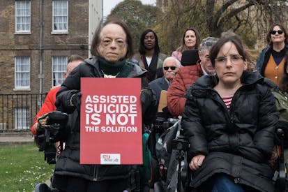 LONDON, UNITED KINGDOM - MARCH 24, 2025: Actress Liz Carr (L) and disabled people who oppose assisted dying demonstrate outside the Houses of Parliament as Kim Leadbeater's Assisted Dying Bill enters the final week of its committee stage in London, United Kingdom on March 24, 2025.