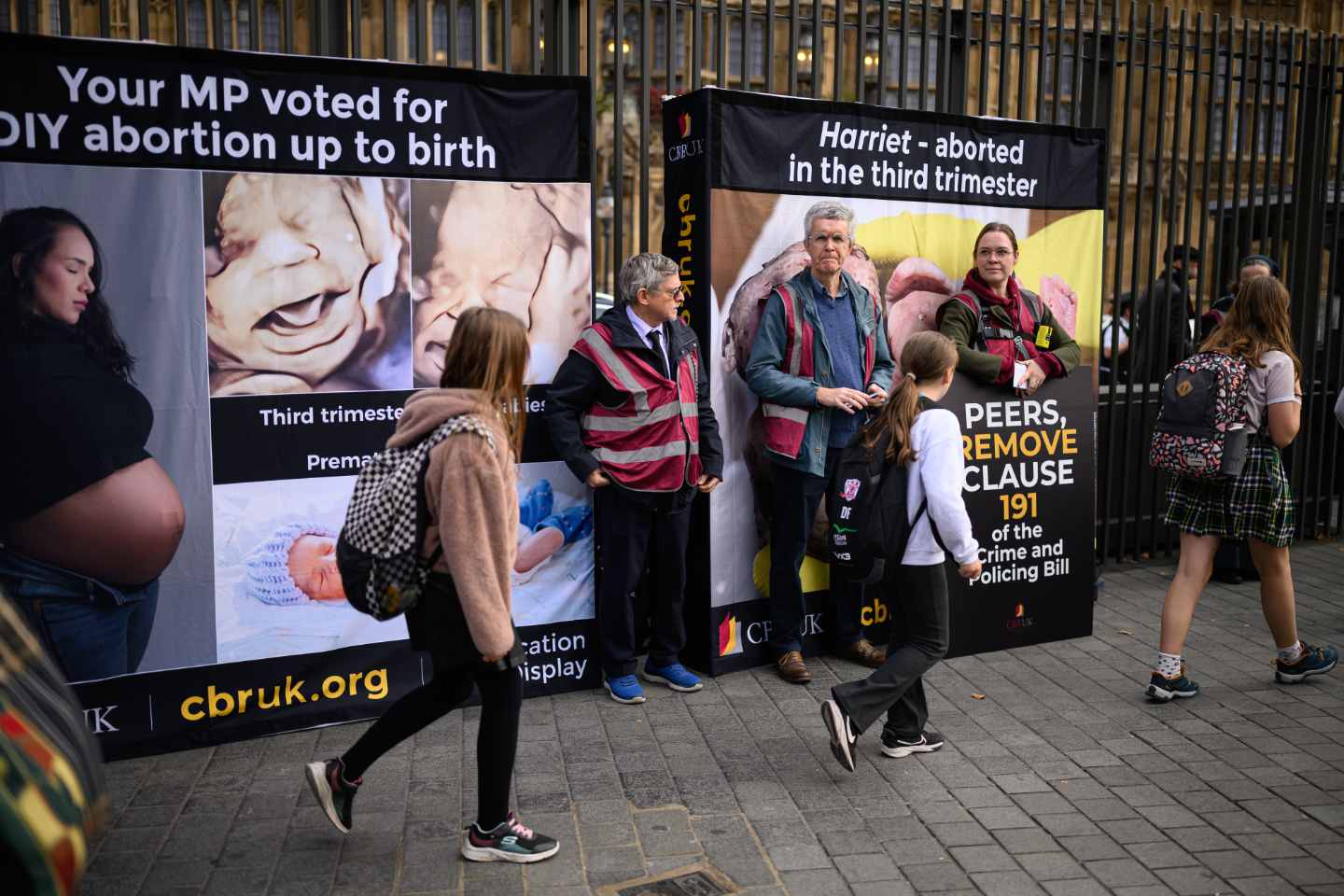 Protesters and campaigners gathered outside the UK Parliament during debate on the abortion decriminalization bill