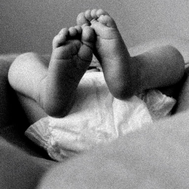 Baby wearing diaper black and white