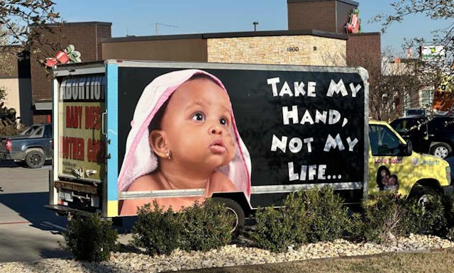 Photo of 'Carolyn' billboard truck: Pro-Life Waco/PLPS photo of Pro-Life Waco's billboard truck showing baby and pro-life messages