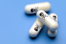 Photo: Getty Images Jeffrey Hamilton Poison pills with skull and crossbones.
