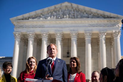 WASHINGTON, DC - NOVEMBER 01: Texas Attorney General Ken Paxton speaks outside the U.S. Supreme Court on November 01, 2021 in Washington, DC. On Monday, the Supreme Court heard arguments in a challenge to the controversial Texas abortion law which bans abortions after 6 weeks.