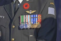Photo: Marvin Samuel Tolentino Pineda/Getty Images Nov 11, 2022. Calgary, Alberta, Canada. A member of the Canadian Armed Forces wearing a remembrace poppy.
