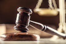 Photo: SimpleImages/Getty Images The judge's gavel and scales as a symbol of the judiciary and justice.