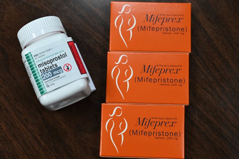 Photo: ROBYN BECK/AFP via Getty Images Mifepristone (Mifeprex) and Misoprostol, the two drugs used in a medication abortion, are seen at the Women's Reproductive Clinic, which provides legal medication abortion services, in Santa Teresa, New Mexico, on June 17, 2022. Mifepristone is taken first to stop the pregnancy, followed by Misoprostol to induce bleeding. - In the wake of Friday's ruling by the US Supreme Court striking down Roe v Wade and the federally protected right to an abortion, women from Texas and other states are traveling to clinics like the Women's Reproductive Health Clinic in New Mexico for legal abortion services under the state's more liberal laws. - RESTRICTED TO EDITORIAL USE (Photo by Robyn Beck / AFP) / RESTRICTED TO EDITORIAL USE)