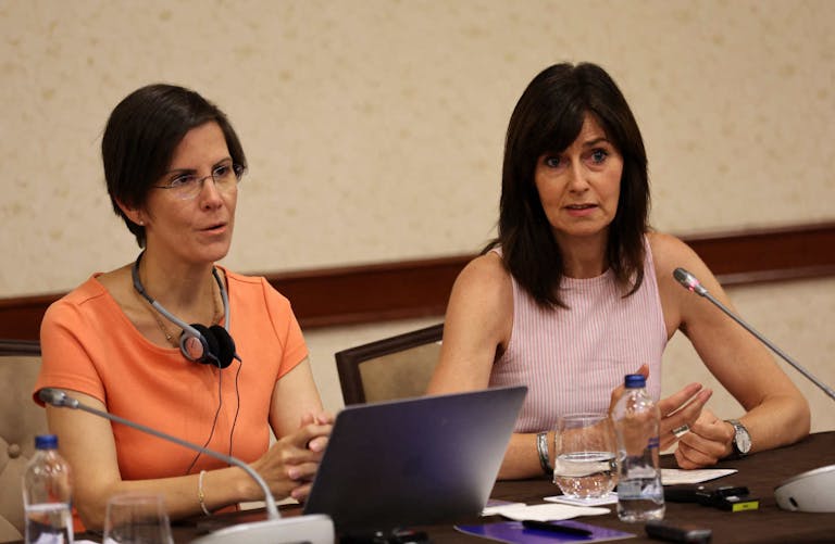 United Nations Special Rapporteur on violence against women, its causes and consequences, Reem Alsalem (L) and UN Human Rights Officer Orlagh McCann (R) address a press conference in Ankara on july 27, 2022 where Alsalem shared preliminary findings from her visit to Turkey and urged the Turkish governement to reconsider its decision of withdrawal from Istanbul Convention, a treaty on preventing and fighting violence against women. (Photo by Adem ALTAN / AFP)