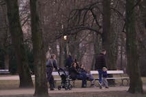 Photo: Jaap Arriens/NurPhoto via Getty Images People watch as a woman with a baby stroller walks past in the Saxon Park, in Warsaw, Poland on 06 March, 2025.