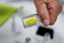 Photo: Simon Wohlfahrt/AFP via Getty Images A doctor holds a flask of "Thiopental" a barbiturate that is used in the practice of euthanasia, in a hospital in Belgium, on February 1, 2024. In 2022, 2,966 people underwent euthanasia in Belgium, according to the federal oversight commission. Of that total, 53 were resident in France