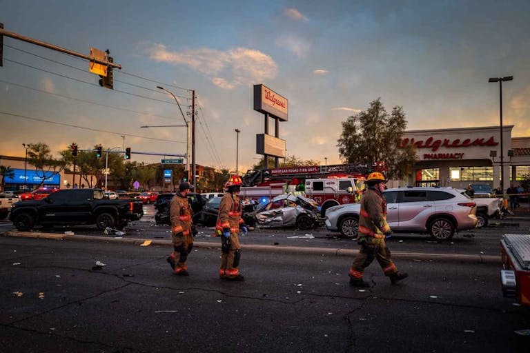 Firefighters work the scene of a 12-car pileup in Las Vegas