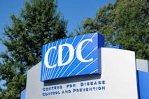 Atlanta, Georgia, USA - August 28, 2011: Close up of entrance sign for Centers for Disease Control and Prevention. Sign located near the 1700 block of Clifton Road in Atlanta, Georgia, on the Emory University campus. Vertical composition.